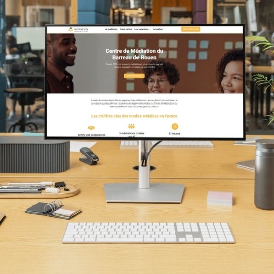 a modern, clean website design mock-up displayed on a laptop screen, with a blurred background of Bordeaux cityscape, bright and professional, no text in image